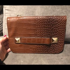 Brown animal print clutch